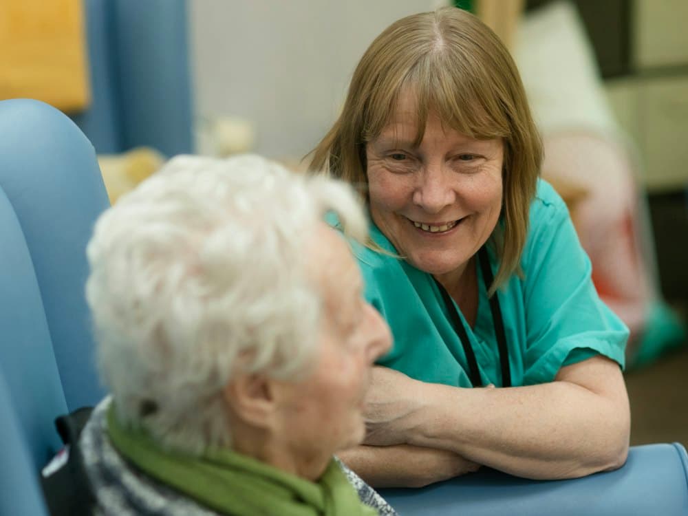 A caregiver with an elderly woman